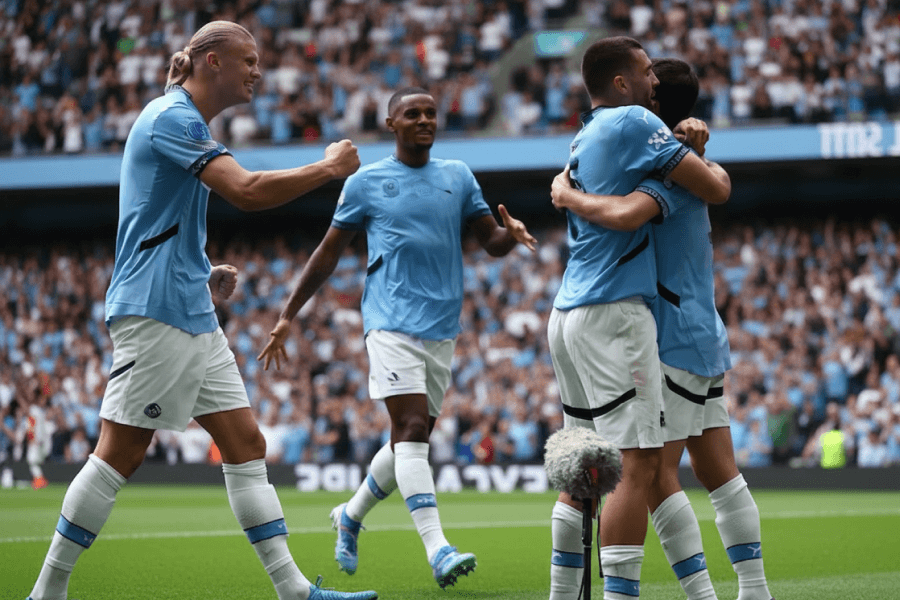 Joueurs de Manchester City célébrant un but décisif.